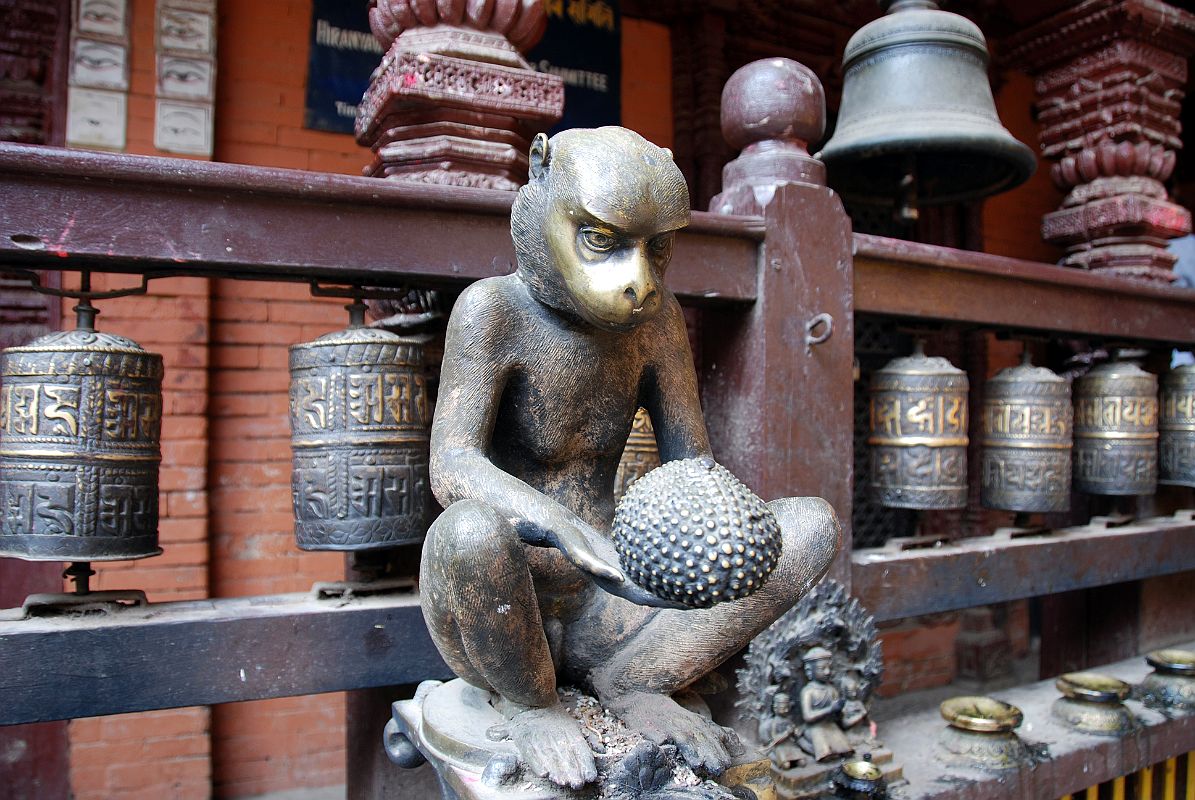 Kathmandu Patan Golden Temple 20 Statue Of A Monkey Holding A Jackfruit 
